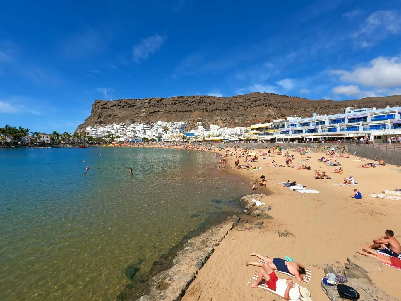 Puerto de Mogán beach with golden sand and calm waters