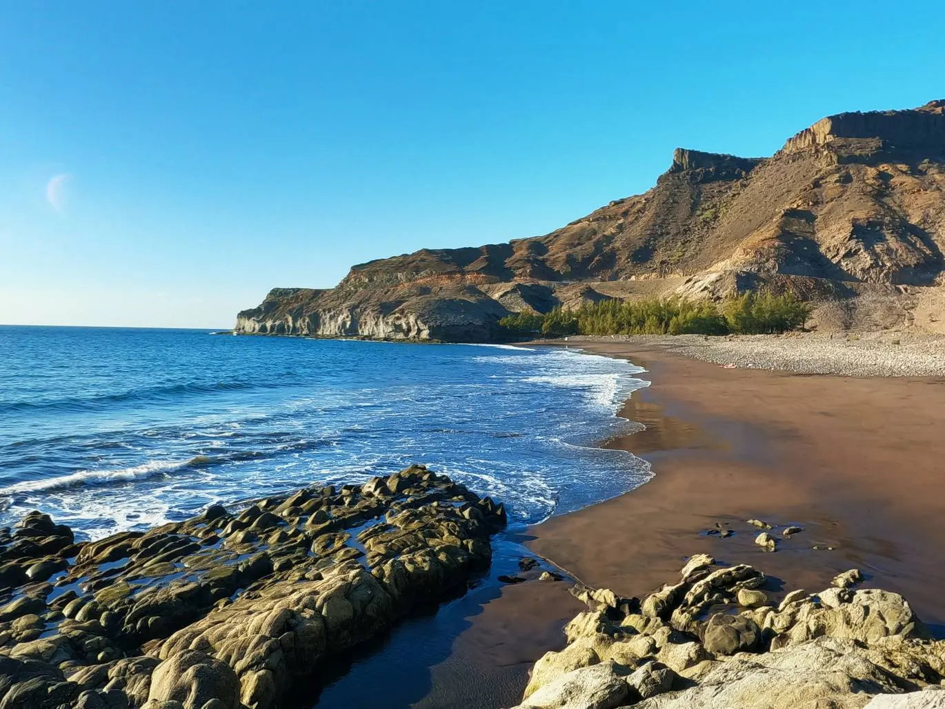 Veneguera Beach wild coastline and natural landscape